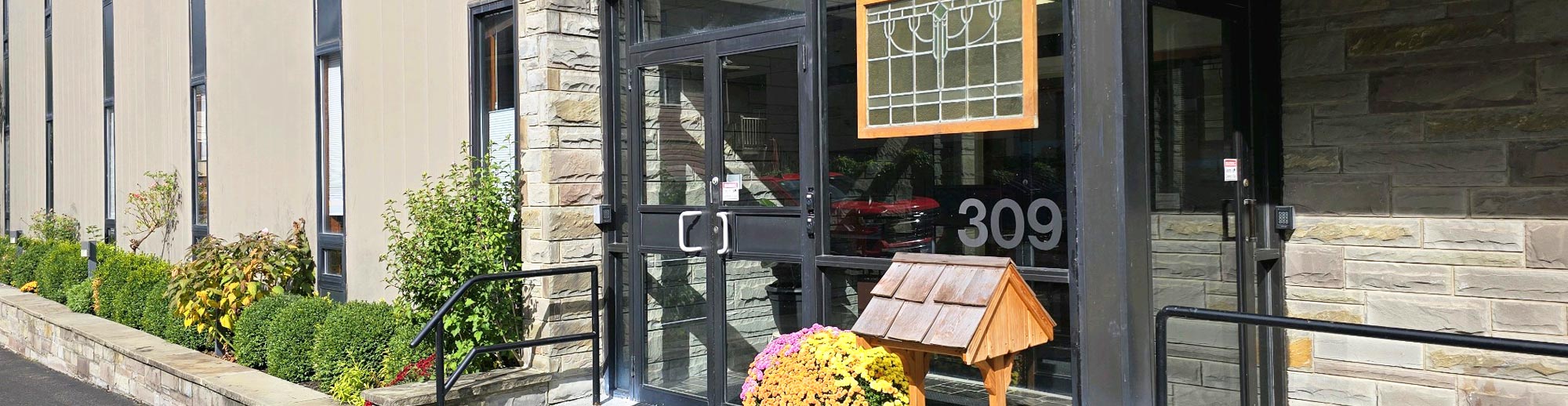 Full color photo of the office entrance in Ithaca, NY.